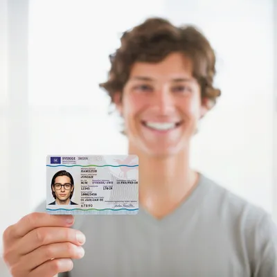 Sweden Identity Card — Held to camera
